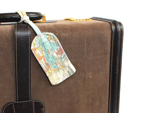 tag and traveling suitcases
